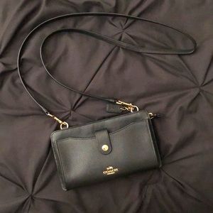 Coach cross body, delicately worn. Great condition.